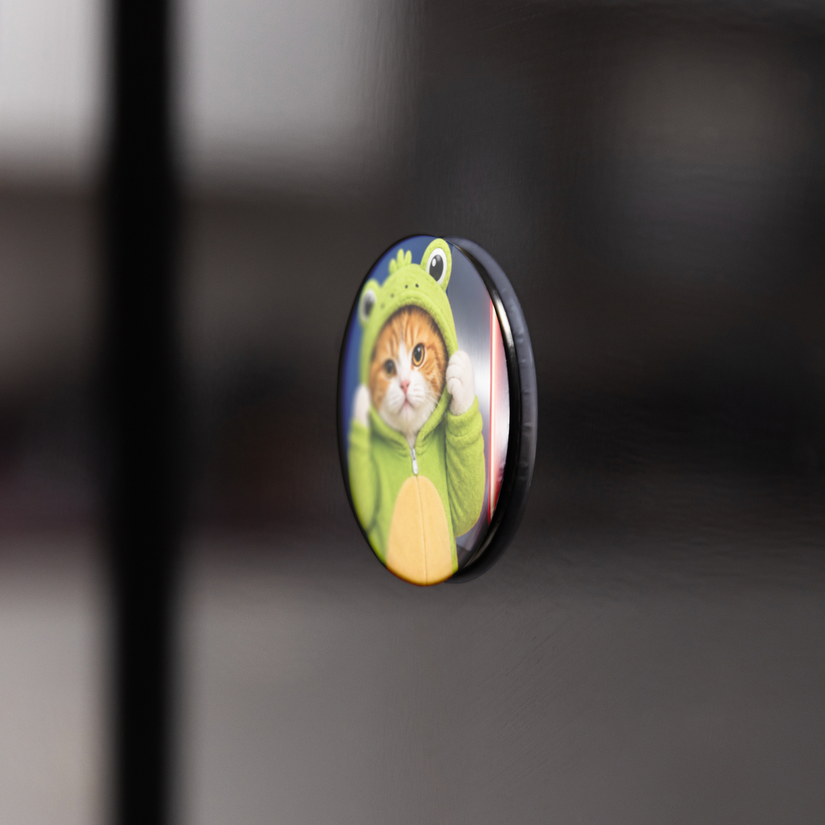 Froggy_Adventures_Round_Fridge_Magnet_RoundButtonMagnet_BlackFridge_AS_Mockup.png_16051734