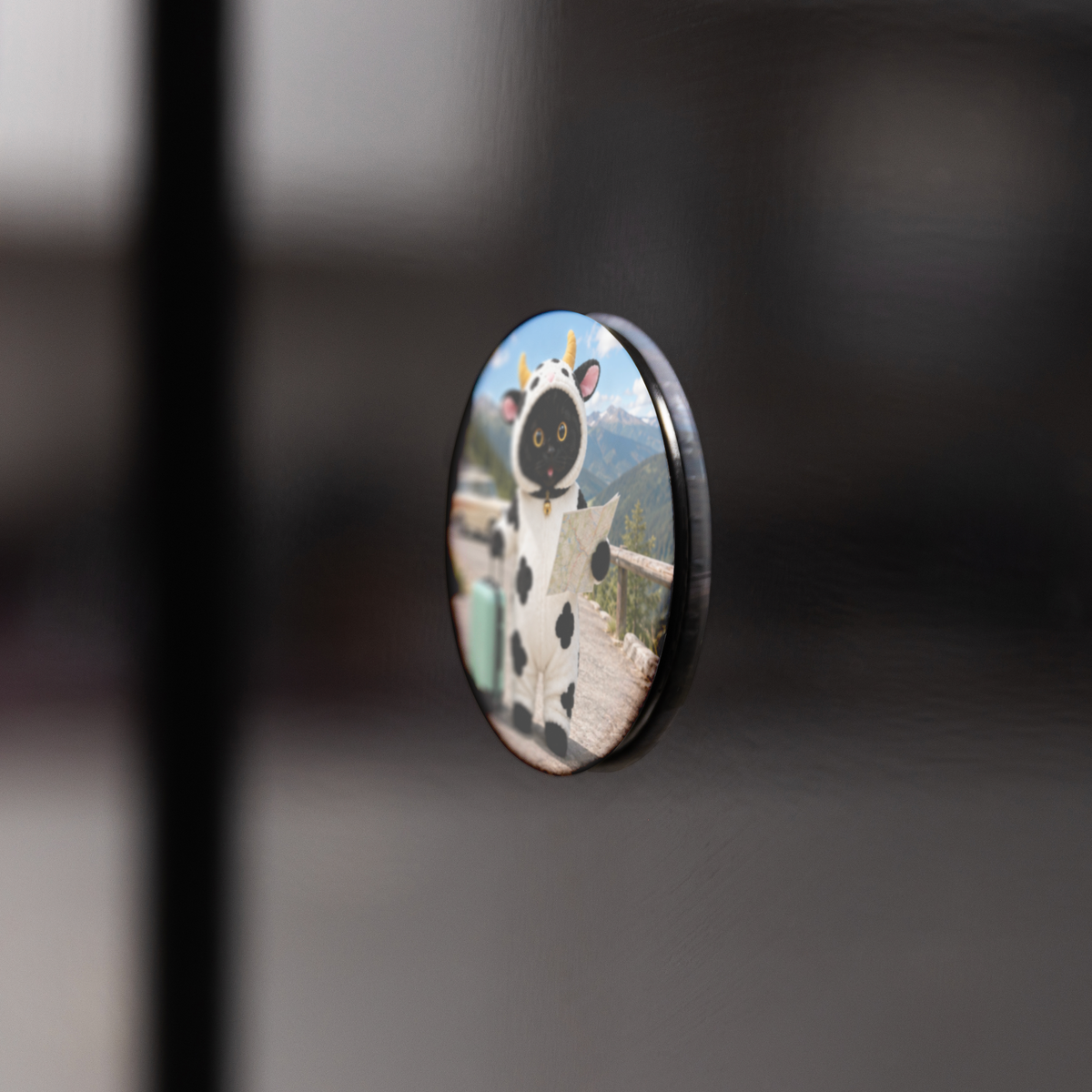 MooMoo_Moments_Round_Fridge_Magnet_RoundButtonMagnet_BlackFridge_AS_Mockup.png_16052176