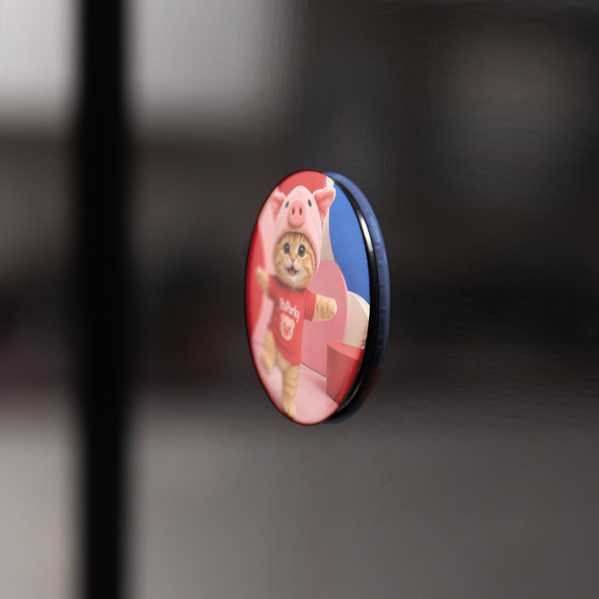 Porky_Signature_Round_Fridge_Magnet_RoundButtonMagnet_BlackFridge_AS_Mockup.png_16052353