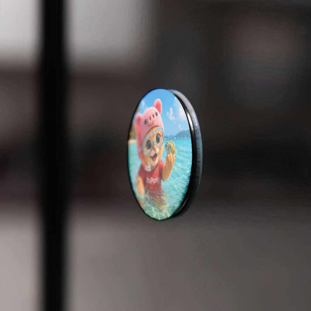 Porky_Signature_Round_Fridge_Magnet_RoundButtonMagnet_BlackFridge_AS_Mockup.png_16052542